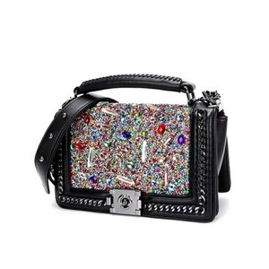 BLACK AND COLORFUL STONE HAND BAG.(KELOLA DS)BRAND SIZE 26'16'11 CM